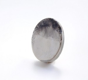 concrete  black and gray oval brooch